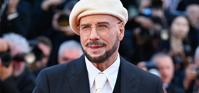 John Travolta Explains the Origin of His Viral Beret Look at Cannes 1