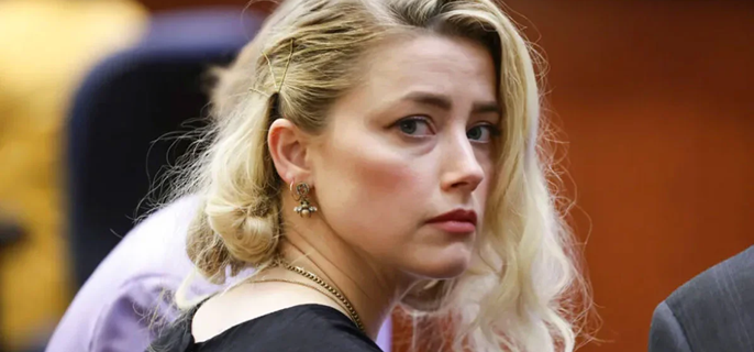Amber Heard shines light on family amid private life 1