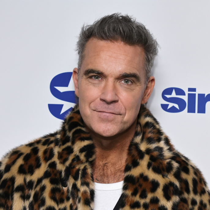 Robbie Williams Impassioned Plea Over Fans Seeking Photos From Celebrities Strikes a Chord: “Allow People the Dignity of Their Privacy”