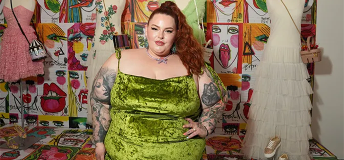 Model Tess Holliday claims United flight attendant told her to lose weight during first-class flight with son 1
