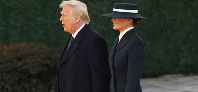 Melania Trump Covers Eyes with Wide-Brimmed Hat to Accompany American-Made Inauguration Dress 1