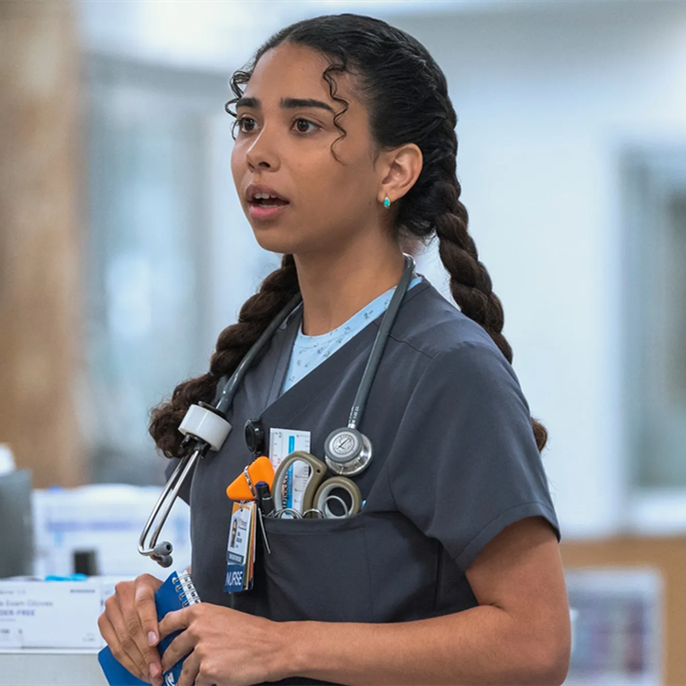 The Pitt star reveals Noah Wyle sprang into action when an injury 'covered' her in blood: 'He became like Dr. Robby'