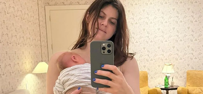 Alexandra Daddario Shares First Photo of Herself Postpartum as She Cuddles with Her Newborn Baby: 'Never Felt More Proud' 1