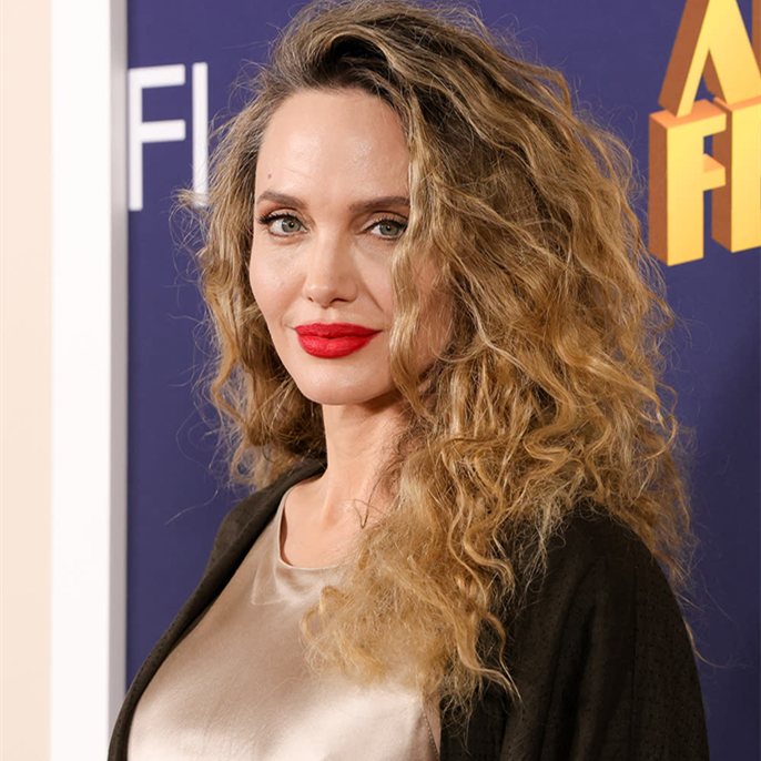 Angelina Jolie Debuts Beachy Curls in Satin Column Dress at ‘Maria’ AFI Fest 2024 Premiere