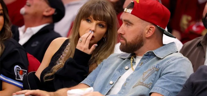 Taylor Swift Helps Travis Kelce Make a Young Fan’s Day at NBA Game 1