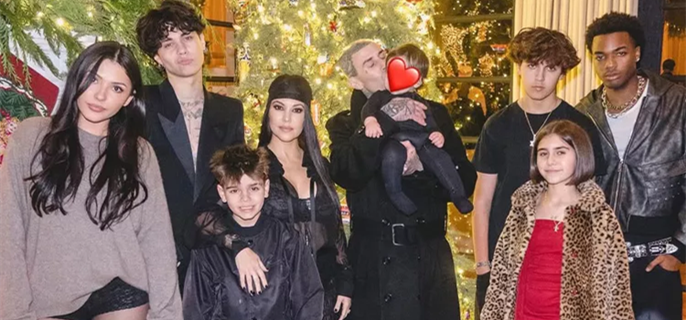 Kourtney Kardashian Shares Festive Photos from Christmas Celebrations with Her Blended Family — and Son Mason Towers Above Her! 1