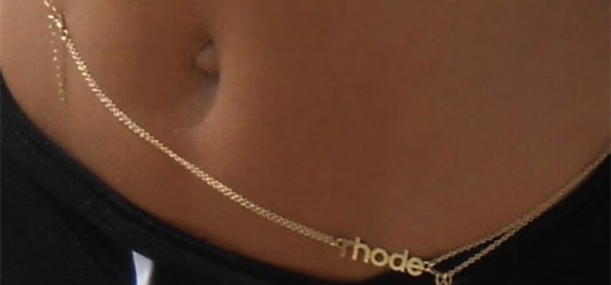 Why Hailey Bieber's New Rhode Lipgloss Belly Chain Has the Internet Divided 1