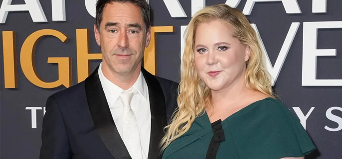 Amy Schumer addresses speculation about marriage: 'Chris and I are still married' 1