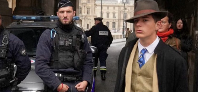 Mystery 'fedora man' at Louvre heist scene revealed as teenage detective fan 1