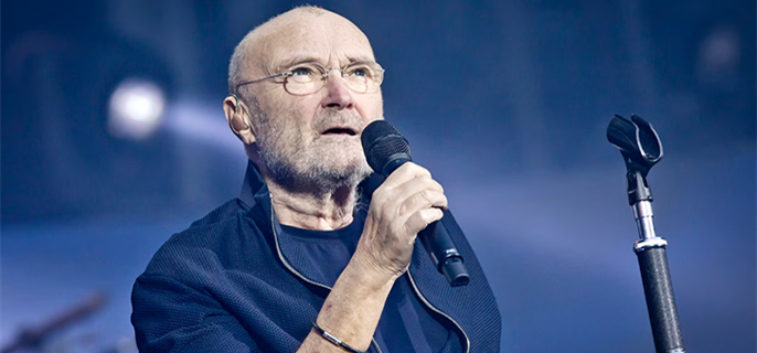 Phil Collins Uses Crutches During Rare Public Appearance After Revealing Five Knee Surgeries 1