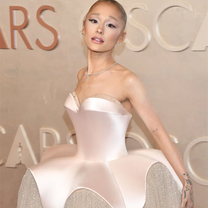 Ariana Grande floats onto Oscars 2025 red carpet in haute couture corset gown