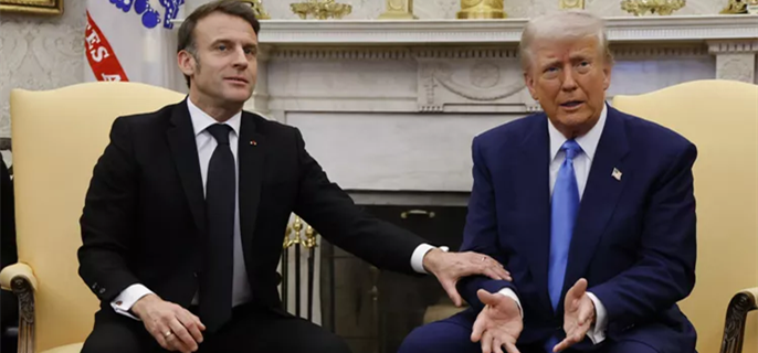 French President Emmanuel Macron Grabs President Trump by the Arm, Corrects Him and Warns, 'Be Careful' 1