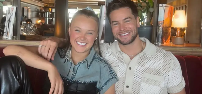 JoJo Siwa Says She Is 'Head Over Heels' as She Confirms Relationship with Chris Hughes: 'It's Not Platonic Anymore' 1