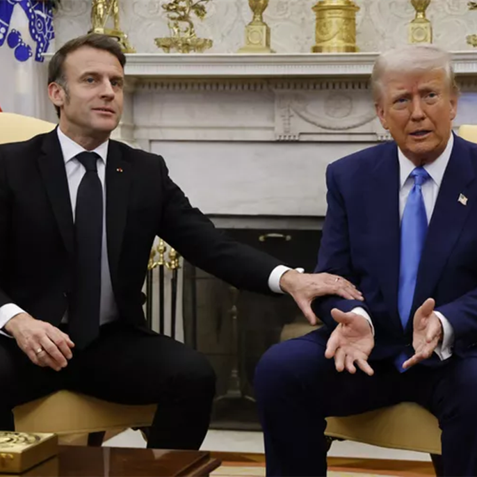 French President Emmanuel Macron Grabs President Trump by the Arm, Corrects Him and Warns, 'Be Careful'