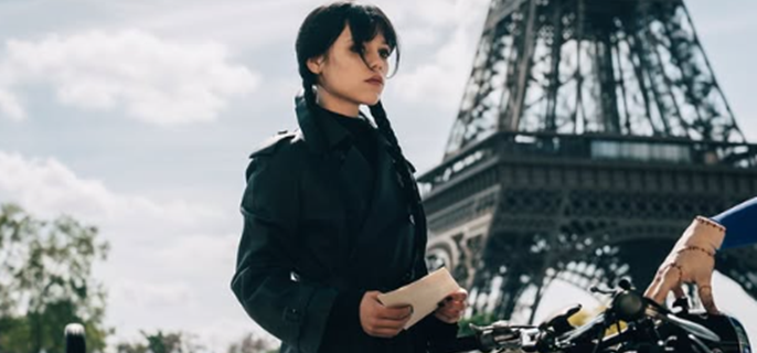 ‘Wednesday’ Season 3 First Look Sees Jenna Ortega Arrive in Paris 1