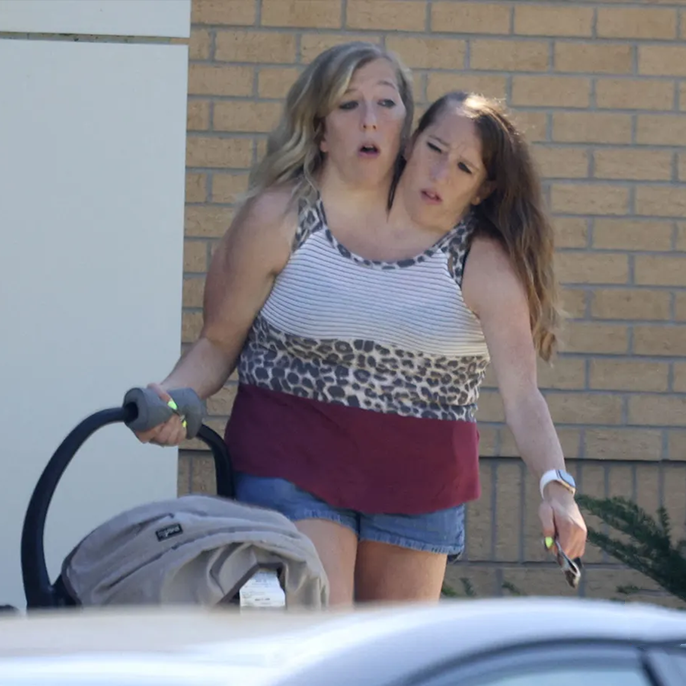 Conjoined Twins Abby & Brittany Hensel Stop For McDonald's with Newborn