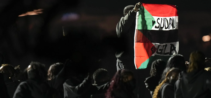 THE INSIDE STORY OF THE SUPER BOWL HALFTIME PERFORMER WHO RAISED A PALESTINE AND SUDAN FLAG 1